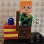 LEGO min233 Alex im Weihnachtspullover mit Geschenk Minifigur